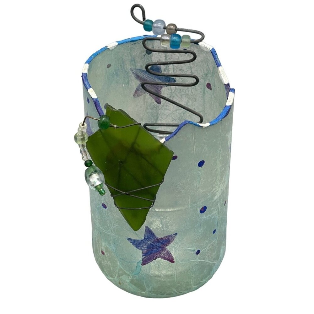 homemade candle holder decoupaged outside blue with stars added green glass READ